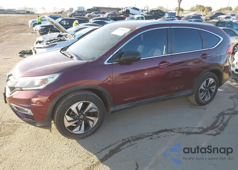 2016 Honda Cr-V Touring z USA, uszkodzony, nr VIN 5J6RM3H98GL020919